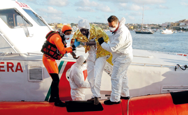 Nella foto: un naufrago messo in salvo dalla Guardia Costiera